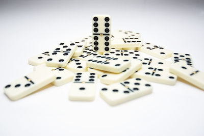 Close-up of piano keys on white background