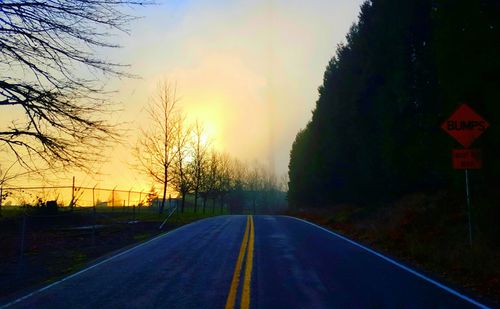 Empty road at sunset
