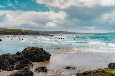 Scenic view of beach against sky