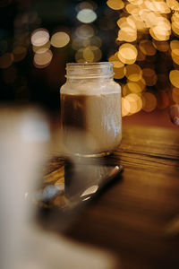 Close-up of glass jar on table