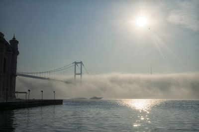 Speed boat and 15 july martyrs in foggy morning istanbul turkey 