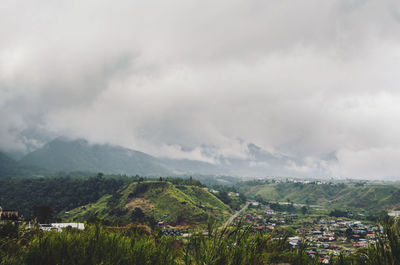 Scenic view of townscape against sky