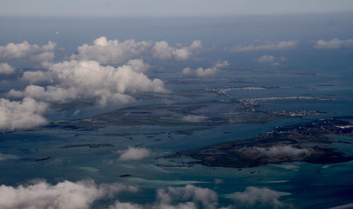 Aerial view of cityscape against sky during sunset