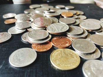 High angle view of coins on table