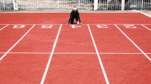 Sports person on running track