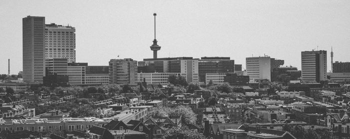 View of skyscrapers in city against clear sky