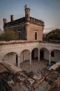 Low angle view of old ruins against sky