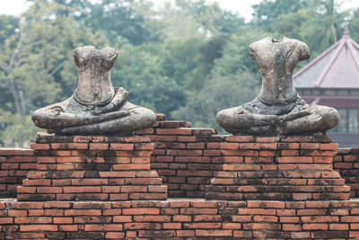 Close-up of statue against temple