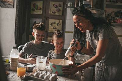 Father and son on table