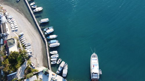 High angle view of sailboats sailing in sea