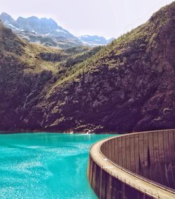 Scenic view of dam by lake