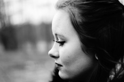 Close-up of woman looking away