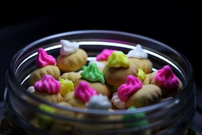 High angle view of multi colored candies in basket