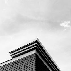Low angle view of skyscraper against sky