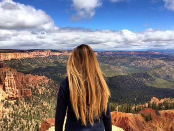 Rear view of woman against sky at bryce canyon national park