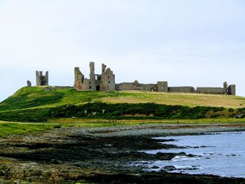 Old ruin building against sky