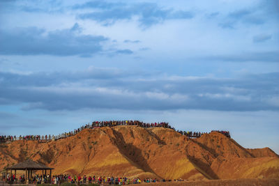 Danxia scenic view of mountain against cloudy sky