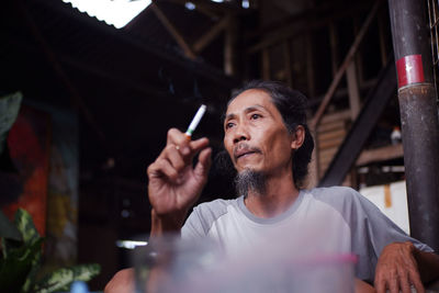 Portrait of man looking away