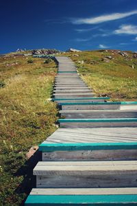 Empty wooden steps on hill