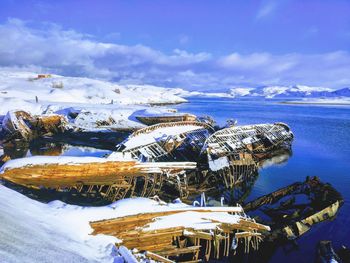 Scenic view of sea against sky during winter