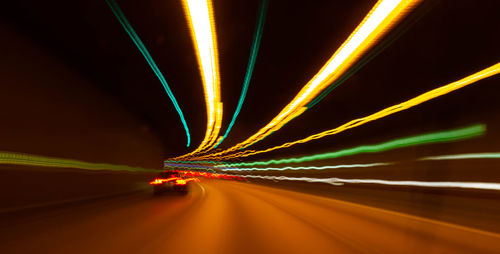 Light trails on road at night