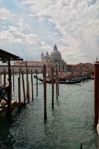 View of wooden posts in sea