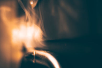 Close-up of lit candle