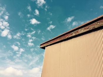 Low angle view of building against blue sky