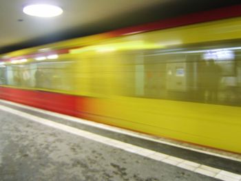 Blurred motion of train at subway station