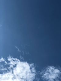 Low angle view of clouds in blue sky