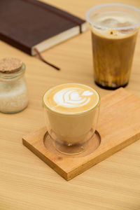 Close-up of coffee cup on table