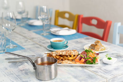 Close-up of breakfast served on table