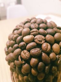 Close-up of coffee beans on table