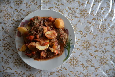 Directly above shot of food in plate on table