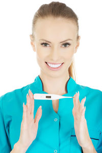 Portrait of a smiling young woman over white background