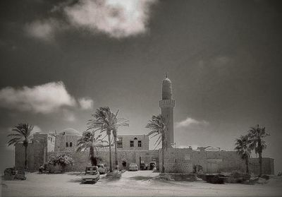 Built structure against cloudy sky