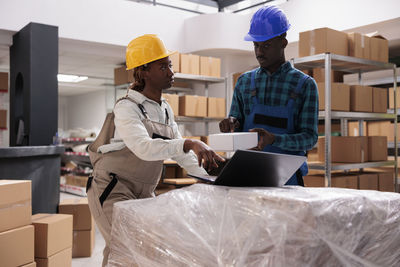 Side view of man working in office