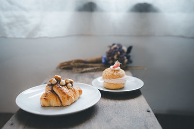 Close-up of cake served on table