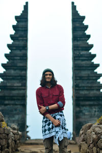 A traveller visiting cetho temple, indonesia