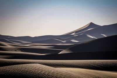 Scenic view of desert against clear sky