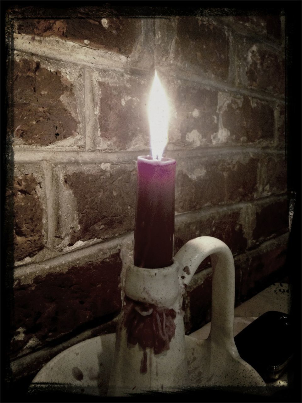 transfer print, auto post production filter, indoors, flame, burning, close-up, fire - natural phenomenon, old, heat - temperature, built structure, wall - building feature, no people, damaged, abandoned, candle, architecture, sunlight, glowing, weathered, illuminated