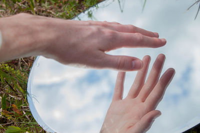 Close-up of hand against blurred background