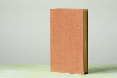 Close-up of open book against white background