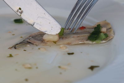 High angle view of meat in plate on table