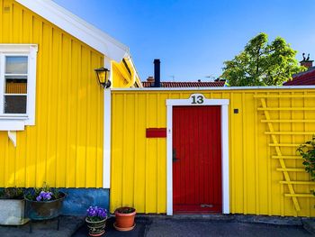 Yellow building against blue sky