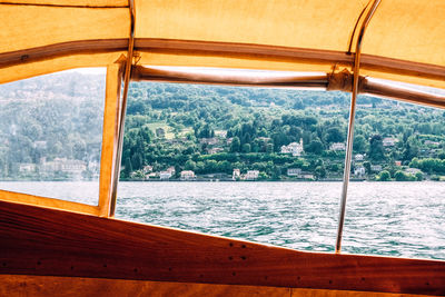 Scenic view of sea seen through window