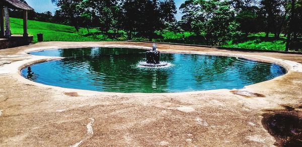 Man swimming in pool