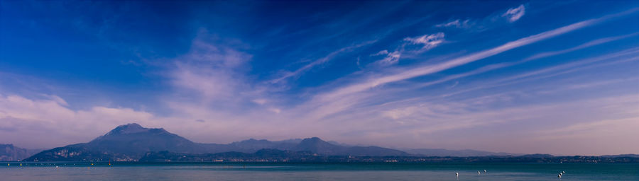 Scenic view of sea against sky at dusk