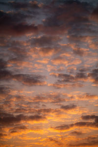 Low angle view of dramatic sky during sunset