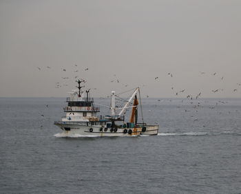 Fishing boats in sea